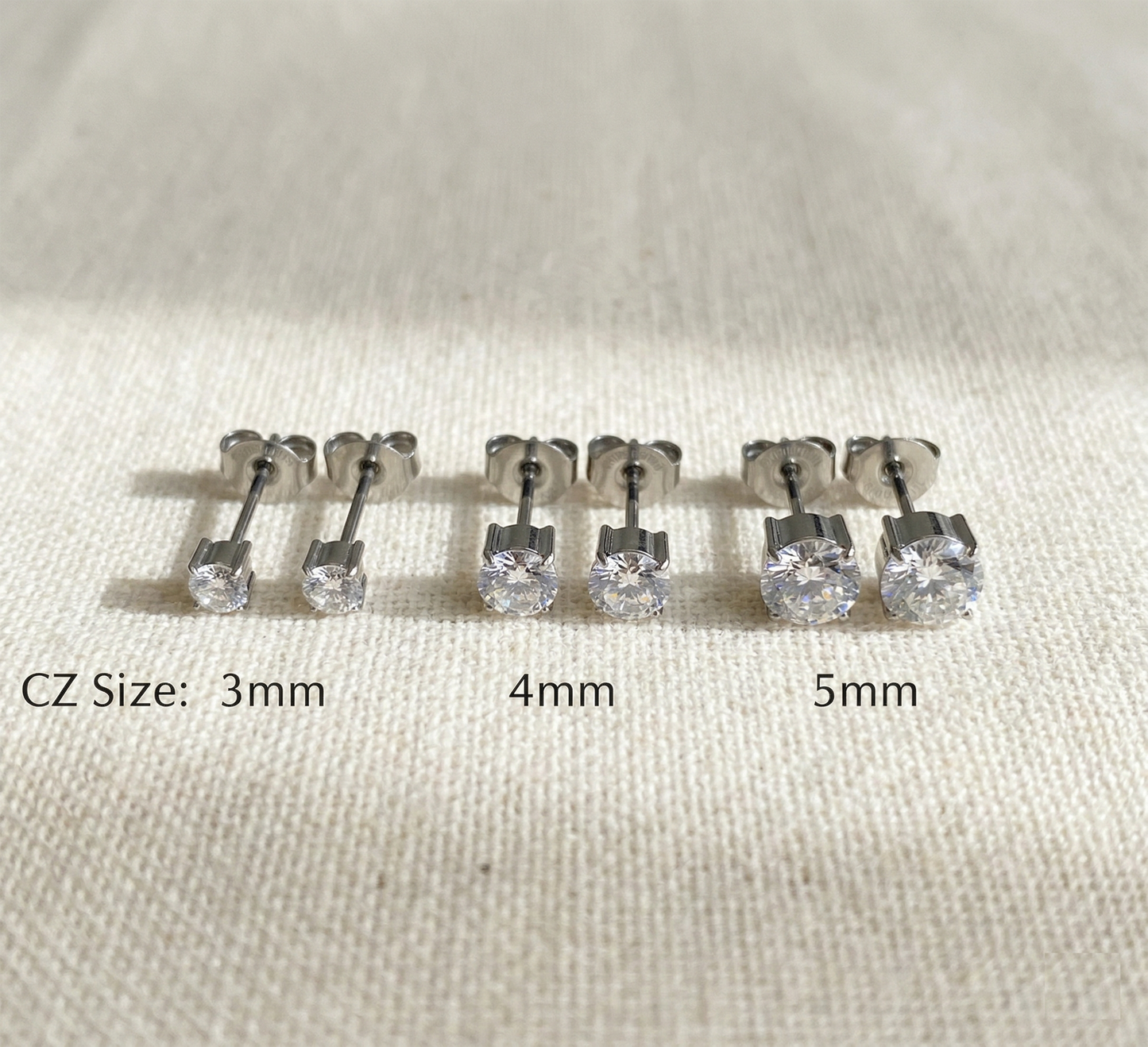 Silver titanium raised prong CZ stud earrings size comparison 3mm 4mm 5mm