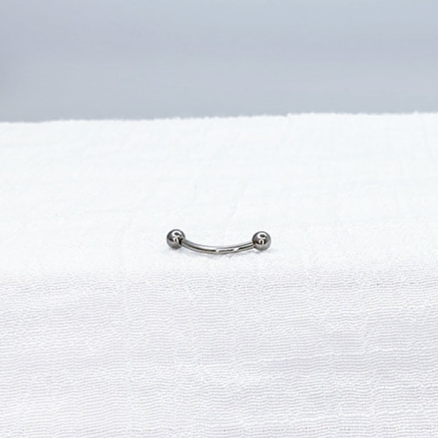 ✨ Titanium Threadless Push In Curved Barbell with One Fixed Ball 16G 14G