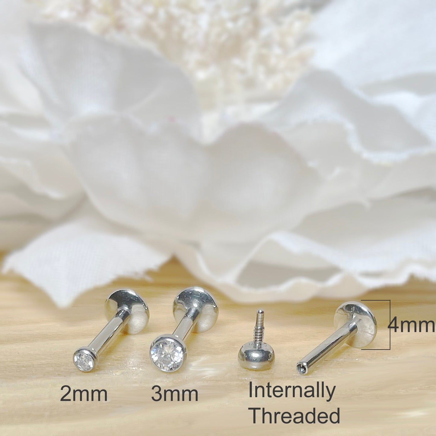 ✨ Titanium Bezel CZ Internally Threaded Convex Labret 18G