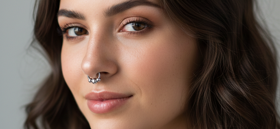 Implant grade titanium septum clickers and circular barbells in gold and silver