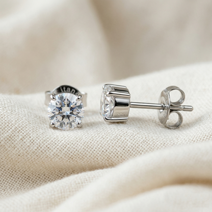 Silver titanium raised prong CZ stud earrings front and side profile view