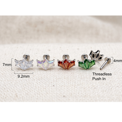 Set of five earrings with measurements on a white fabric background