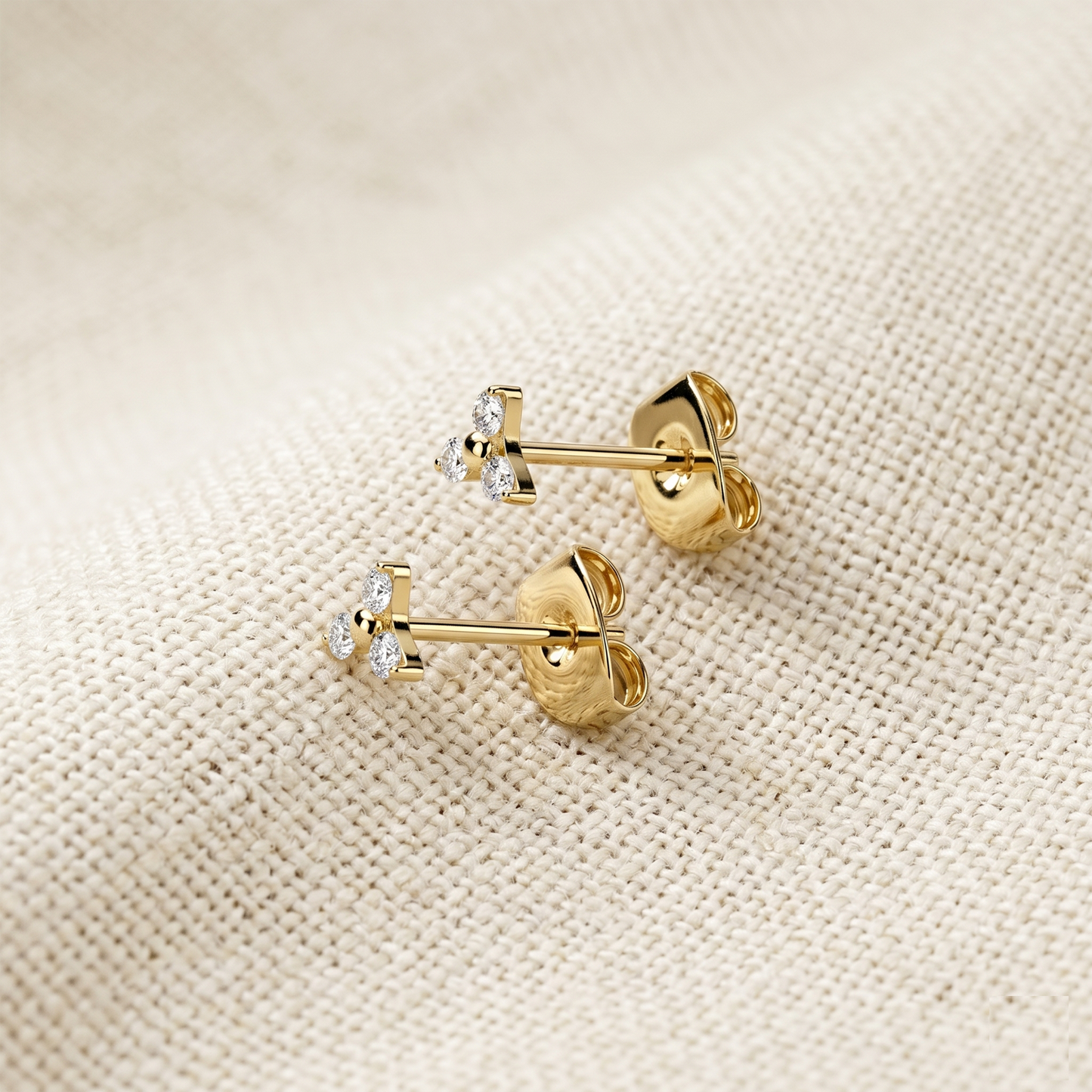 Titanium Trinity CZ Stud Earrings 20G