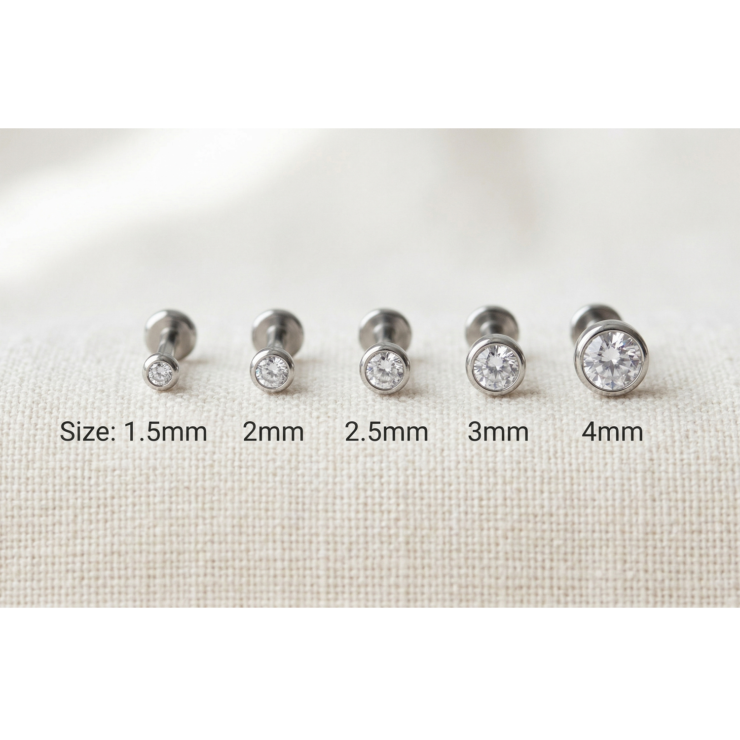 Titanium clear CZ bezel threadless studs size comparison 1.5mm to 4mm