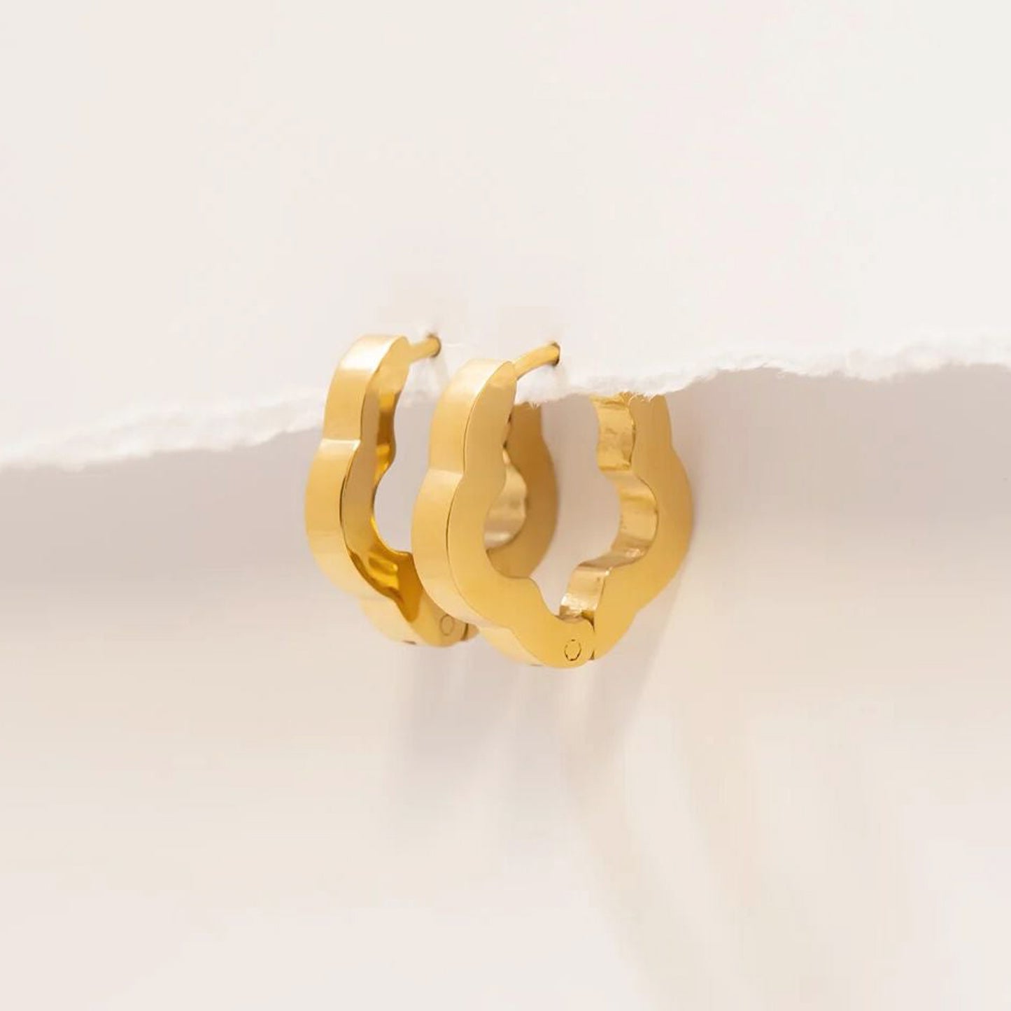 Flower huggie hoop earrings for lobe and cartilage piercings
