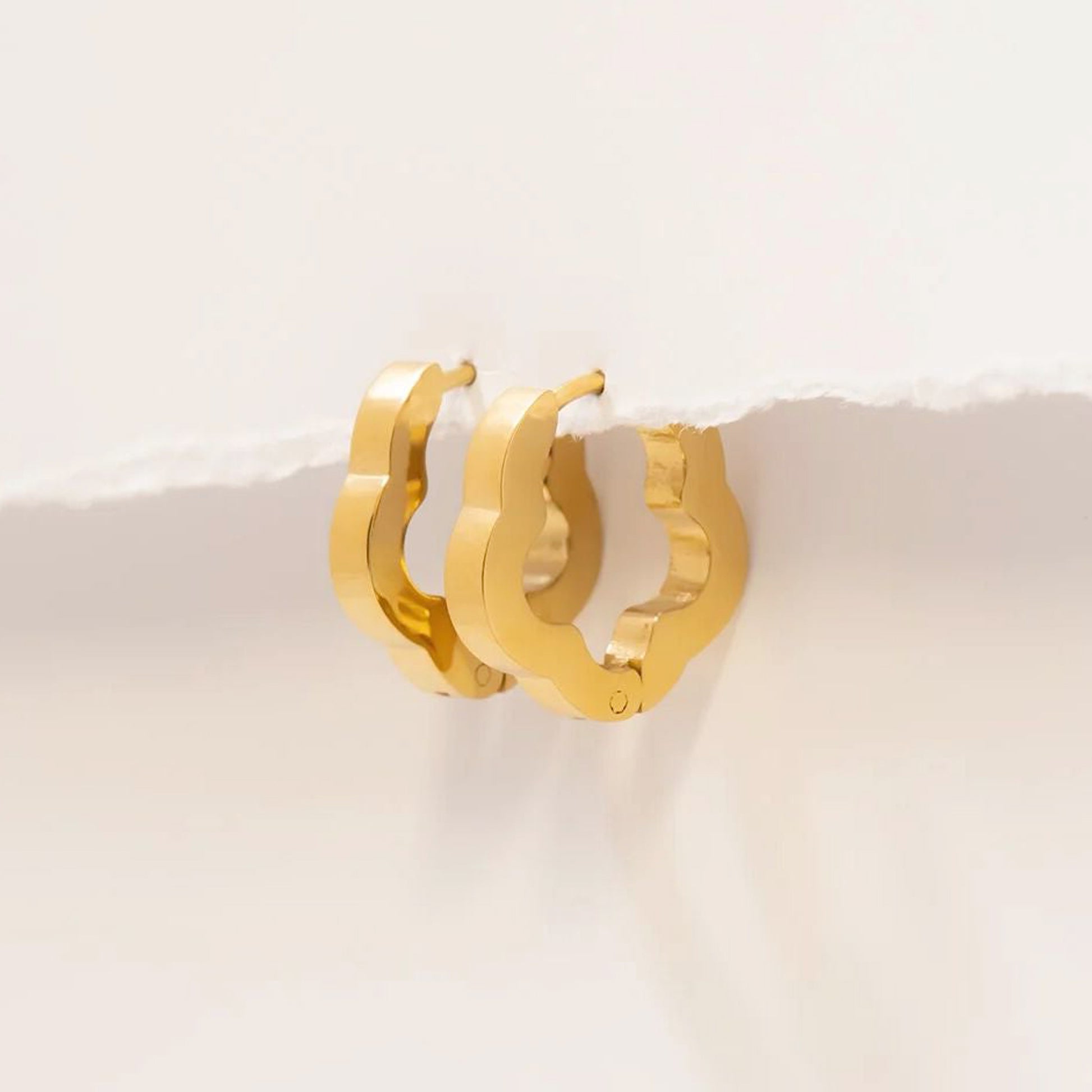 Flower huggie hoop earrings for lobe and cartilage piercings

