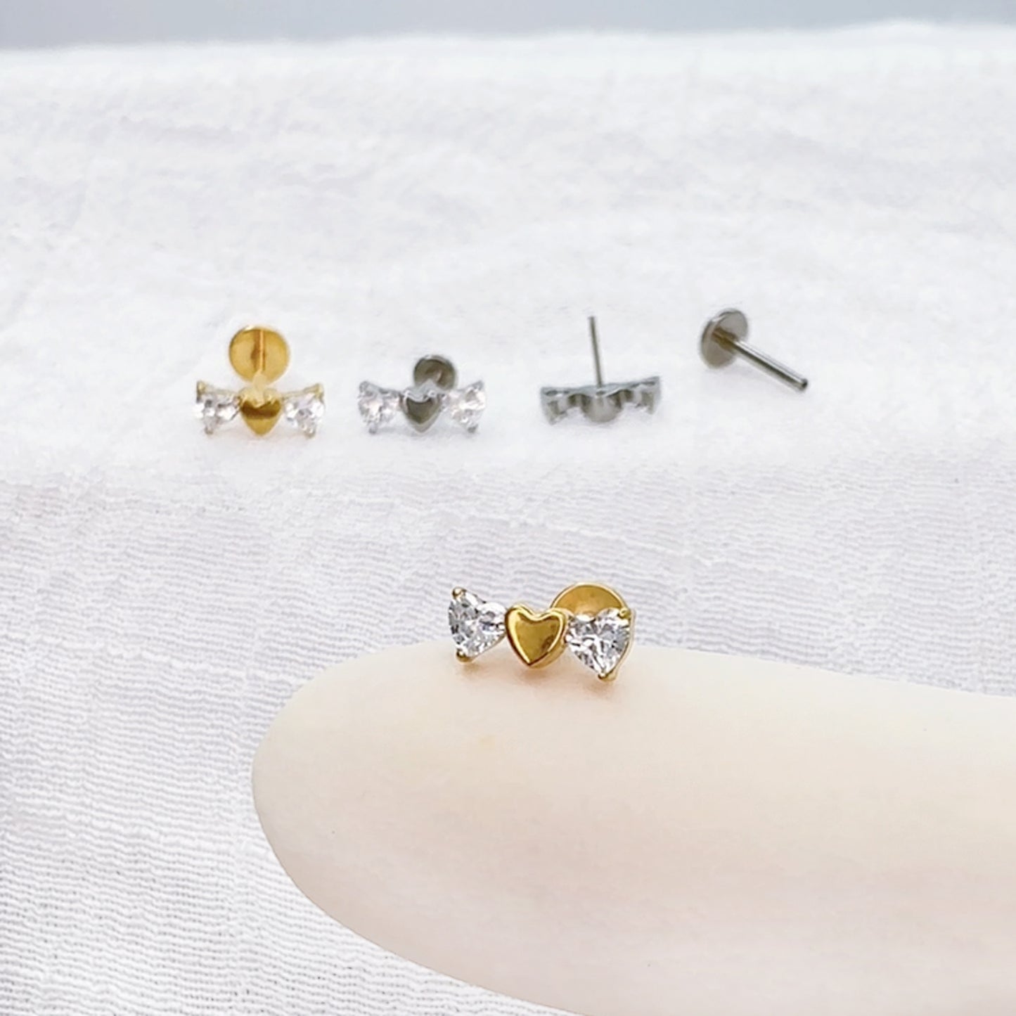 Titanium threadless labret with CZ triple heart top for ear piercing
