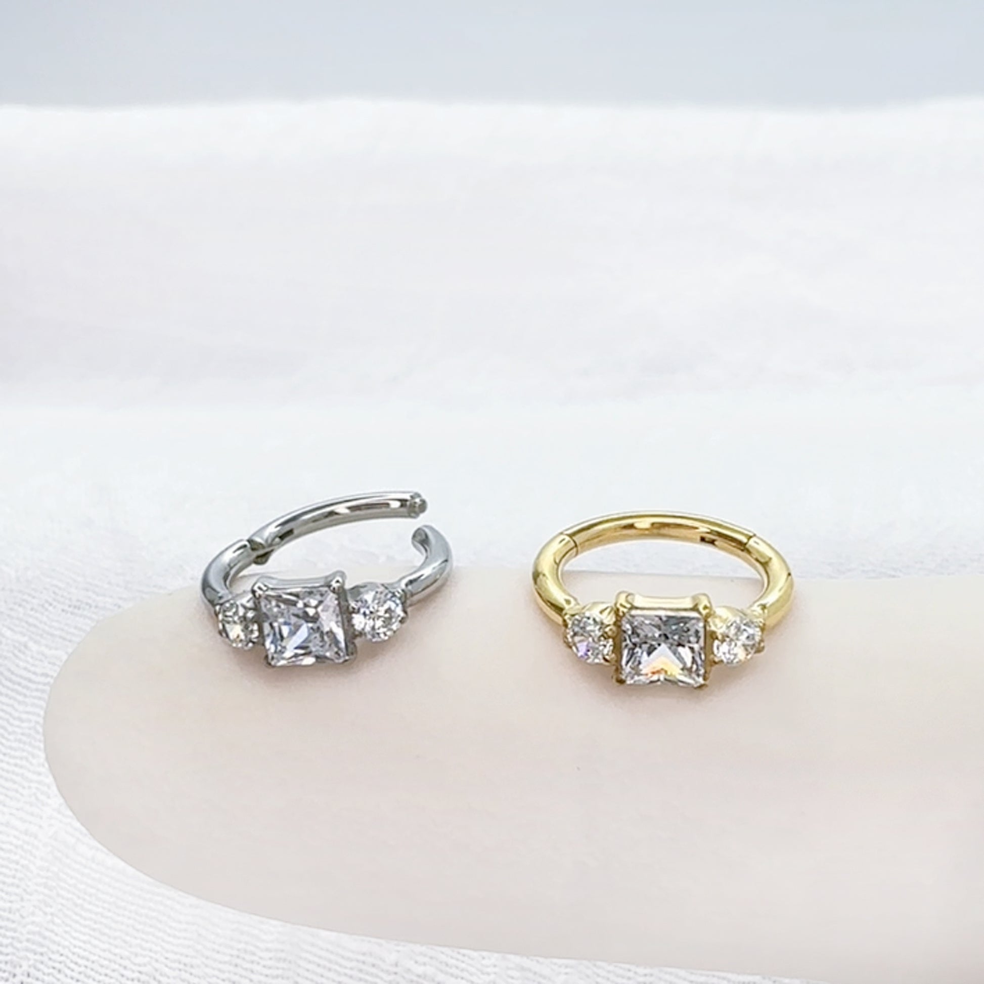 Titanium hinged hoop ring with square and round geometric design
