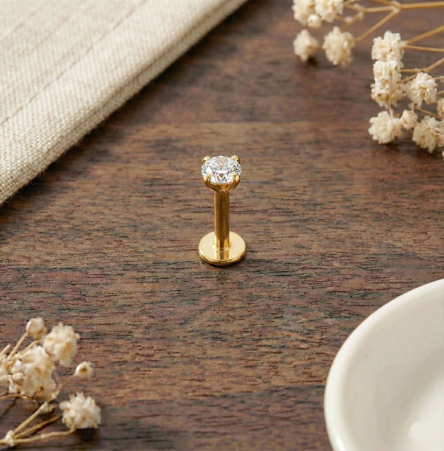 24K gold titanium threaded labret with convex back and CZ top
