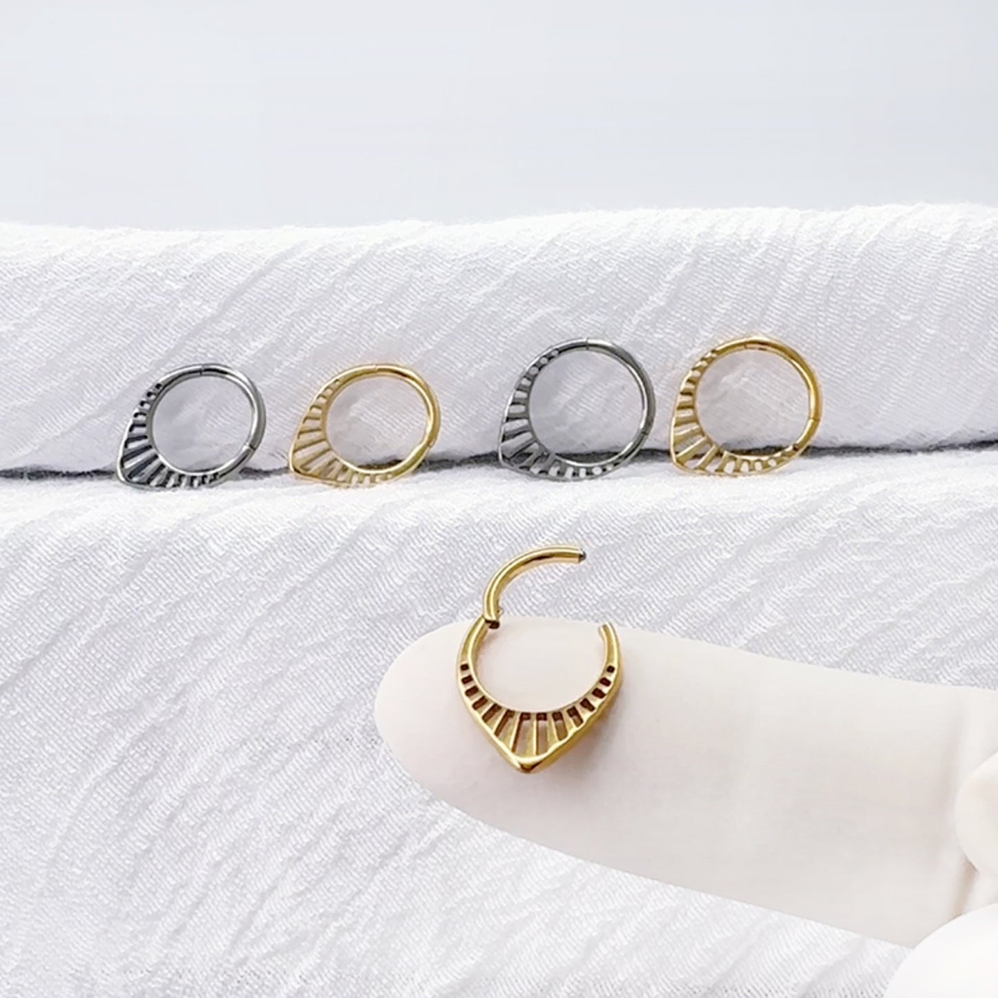 Implant grade titanium hinged hoop ring for daith piercing
