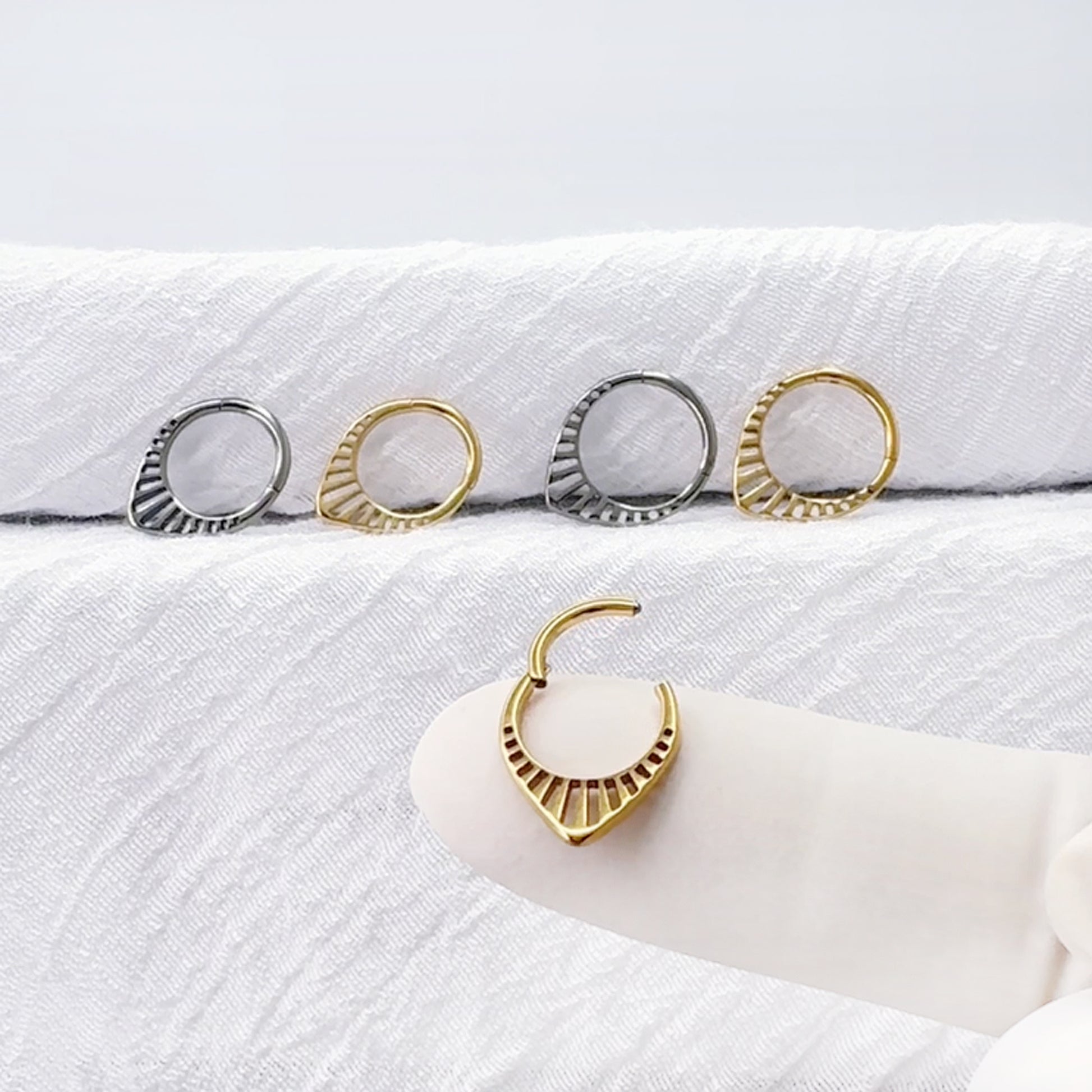 Implant grade titanium hinged hoop ring for daith piercing
