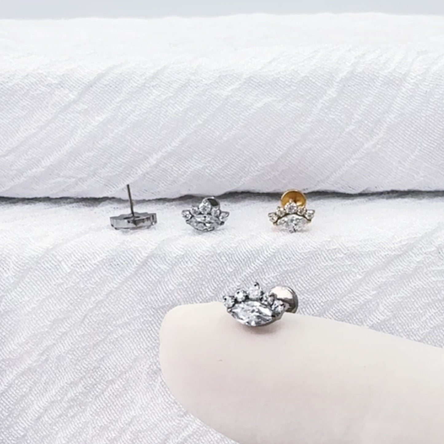 Titanium threadless labret with marquise CZ cluster top for helix piercing
