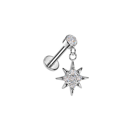 Titanium CZ north star cross dangle threadless stud on white background
