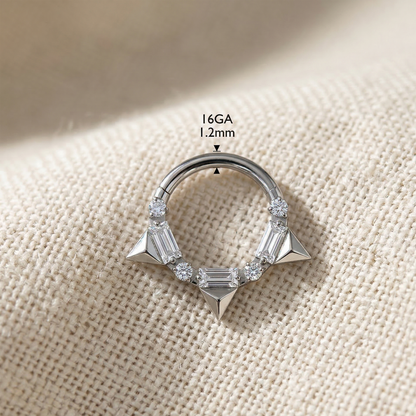 Gold titanium CZ spike hinged hoop ring on cream linen fabric