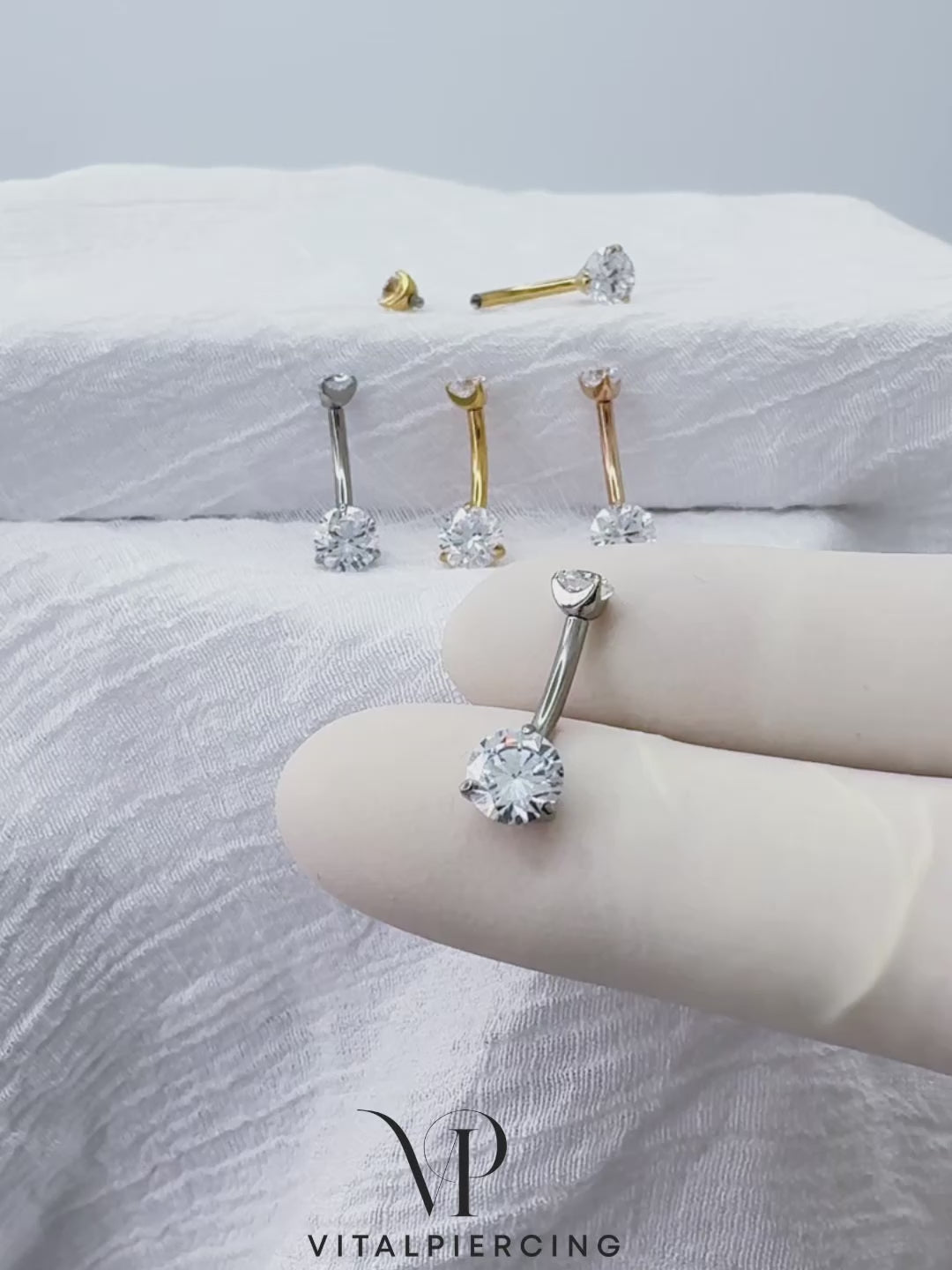 Titanium prong-set CZ belly button ring curved barbell
