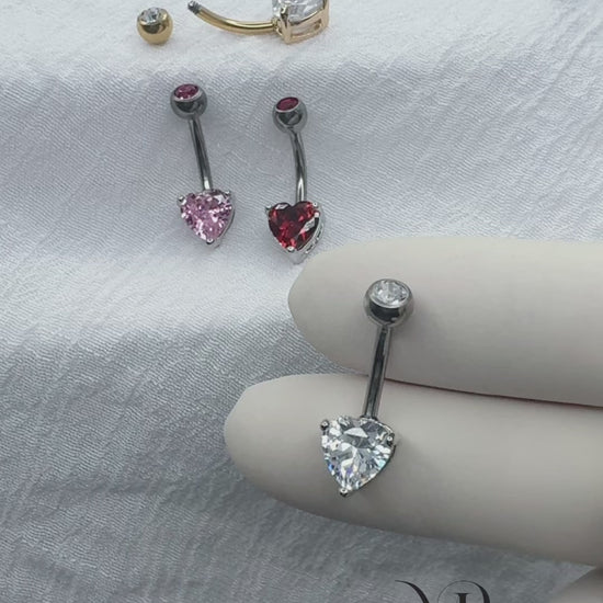 Titanium belly ring with CZ top and heart-shaped brass prong CZ for navel piercing