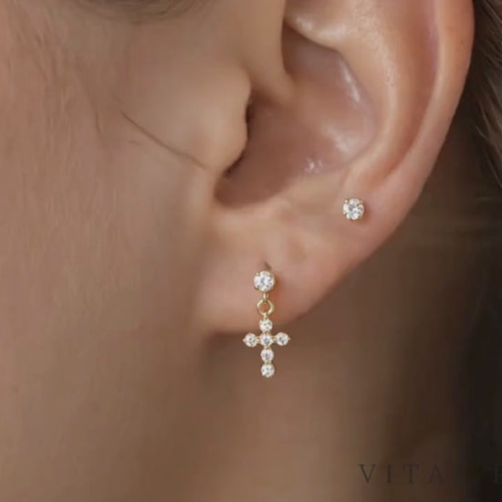 Titanium CZ cross dangle stud video shown on ear
