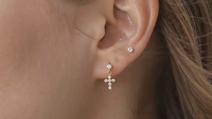 Titanium CZ cross dangle stud video shown on ear

