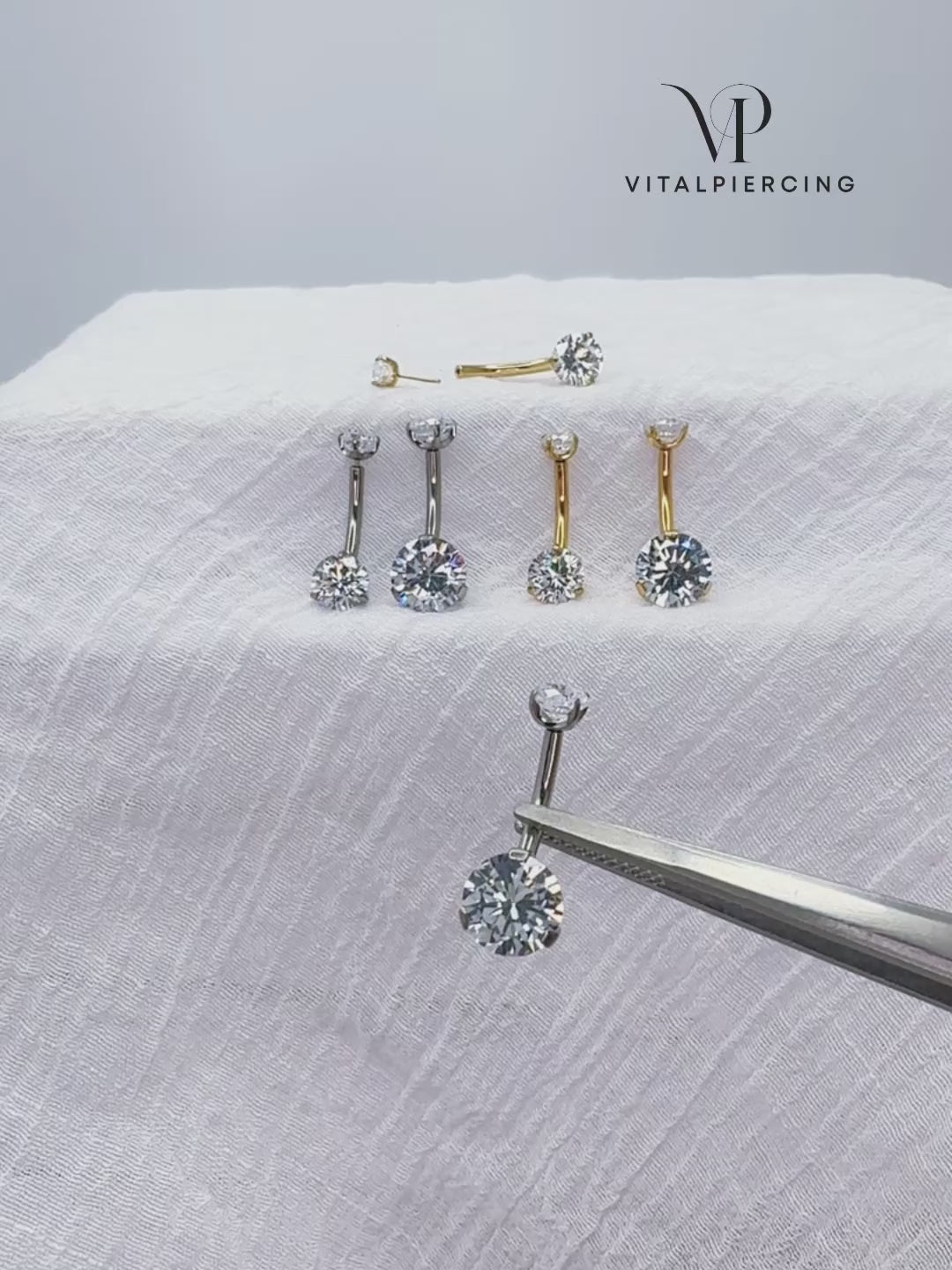 Titanium push-in belly button ring with prong-set round CZ
