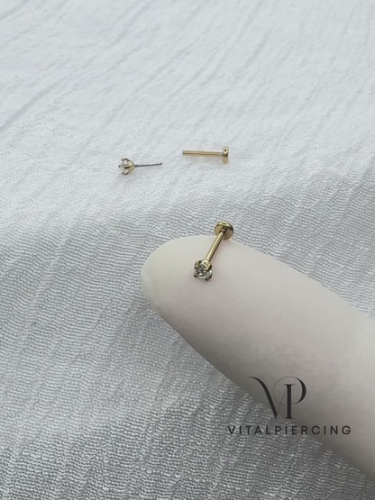 Gold titanium threadless labret with prong-set round CZ top
