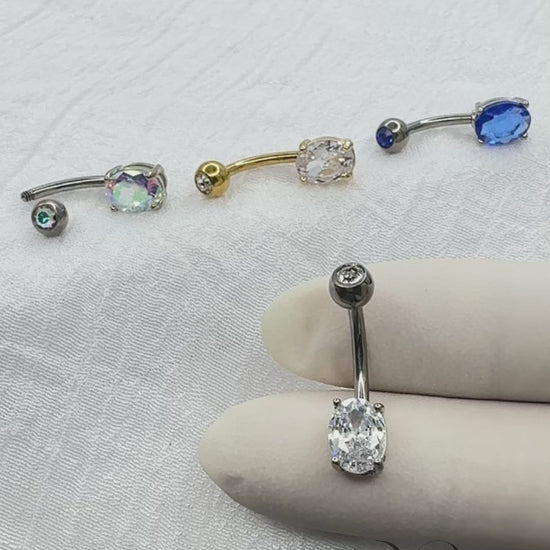 Titanium belly button ring with CZ top and oval design for navel piercing