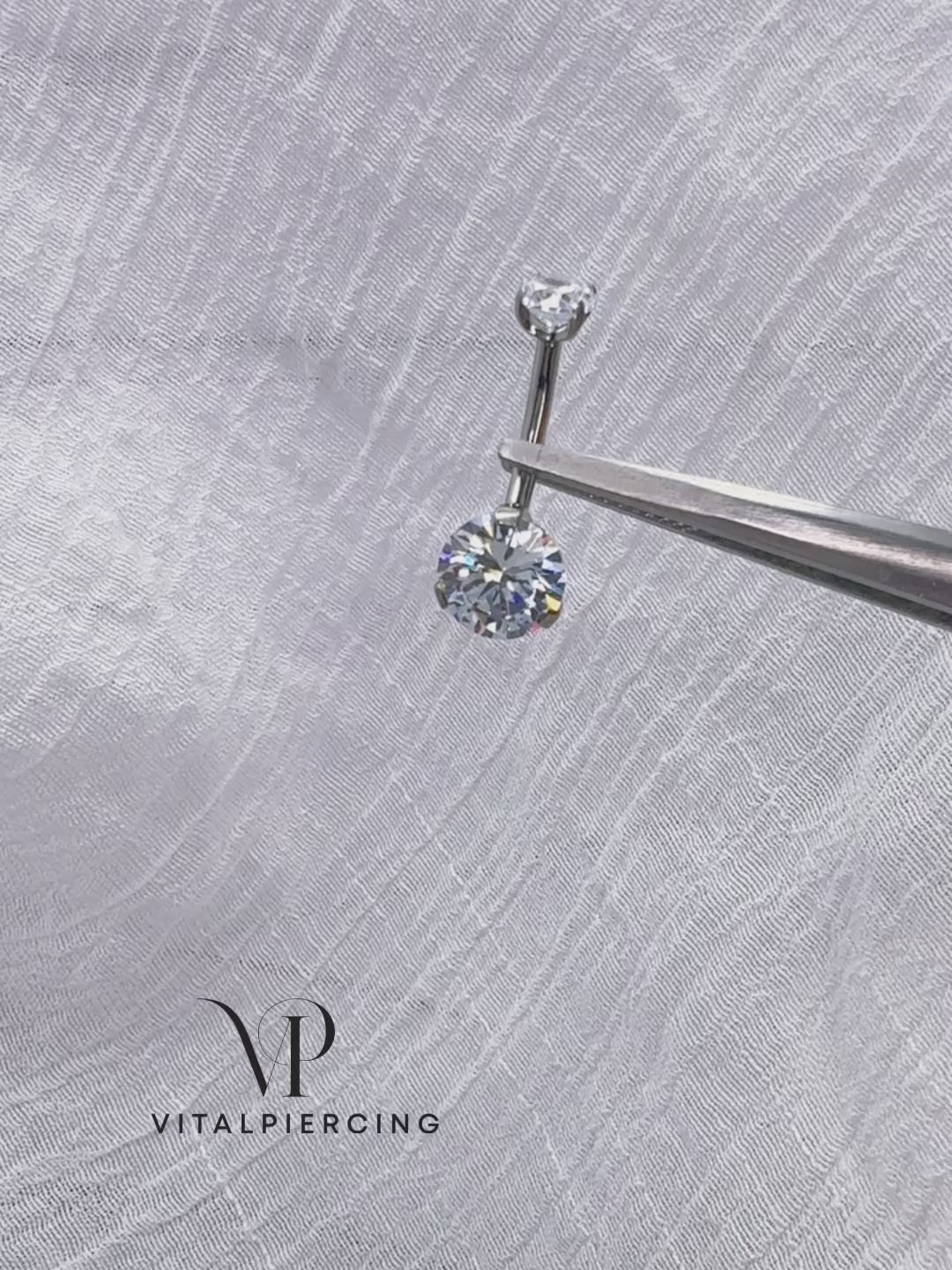 Titanium push-in belly button ring with prong-set round CZ
