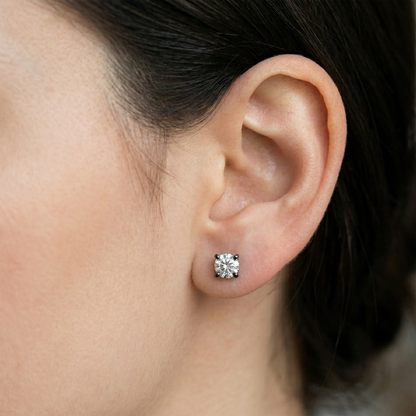 Black titanium clear CZ stud earring shown on ear with lobe piercing