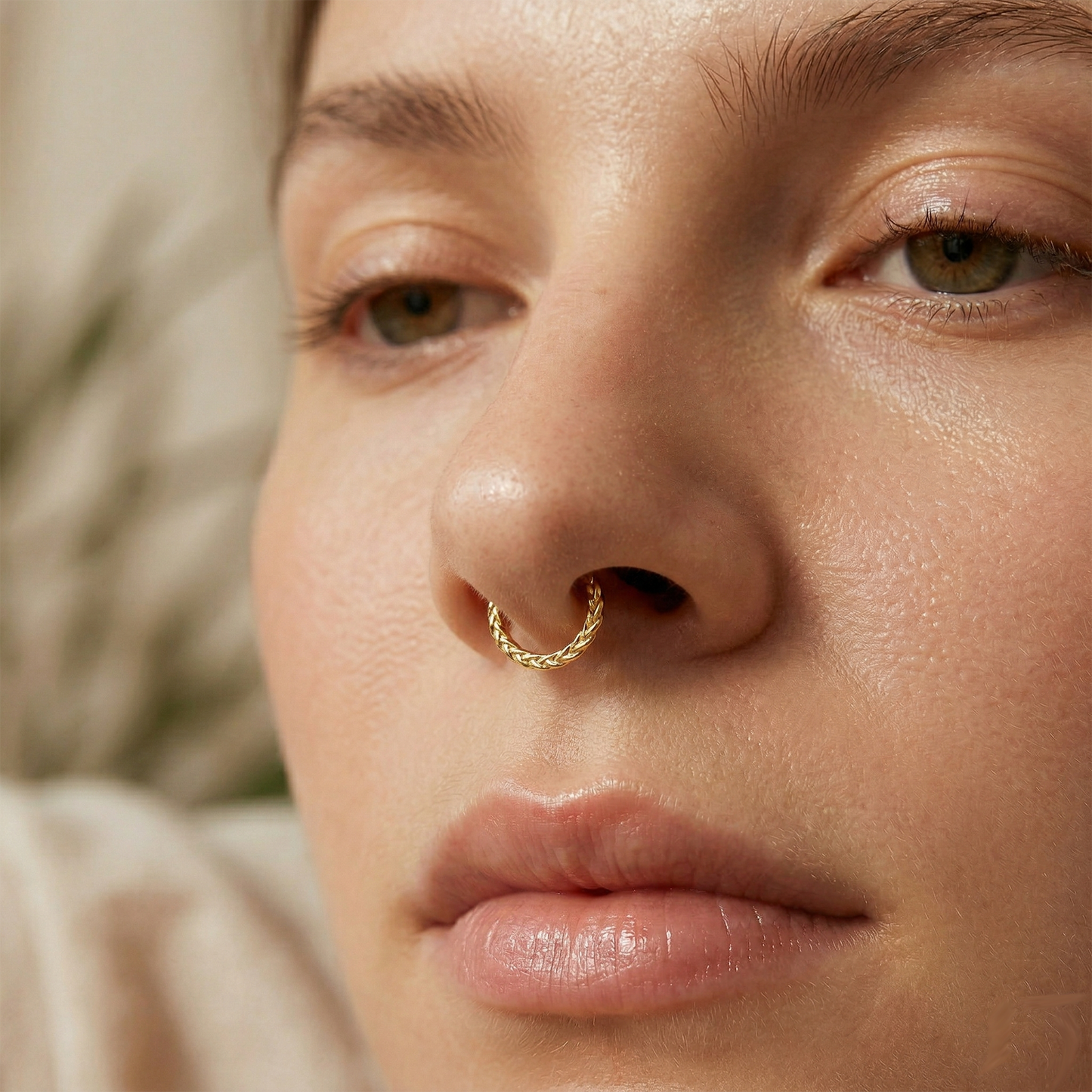Chevron cut hinged hoop worn as septum piercing